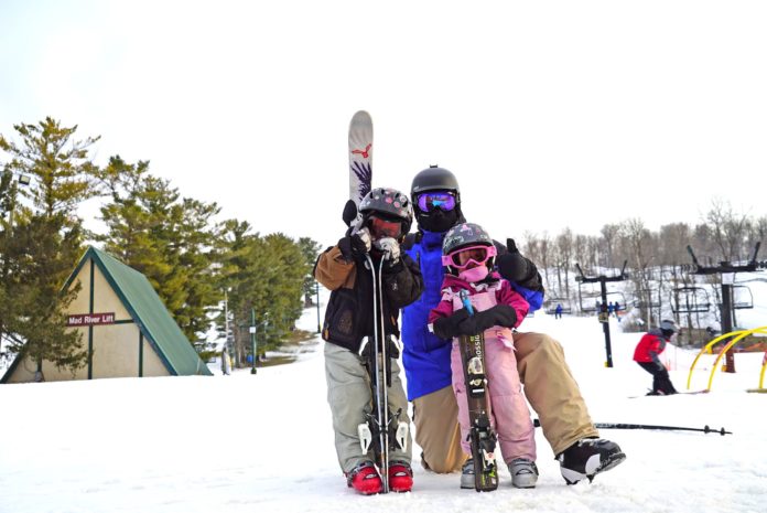 Photo courtesy of Vail ResortsThumbs -Family Enjoying Skiing